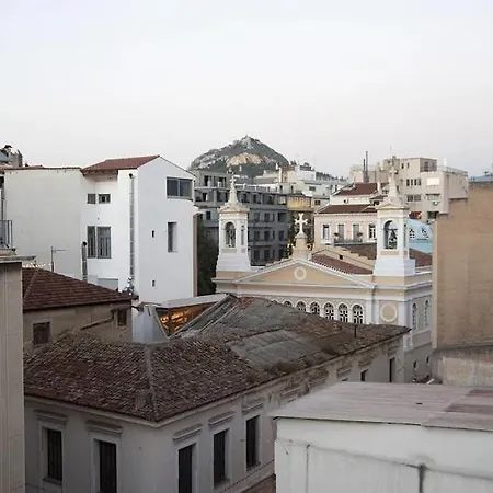 Artist's Lovely Nest Under The Shadow Of The Parthenon